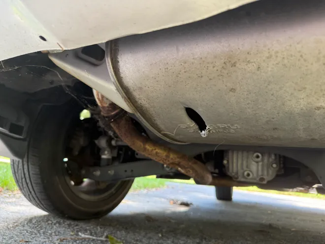 Damage to a vehicle muffler