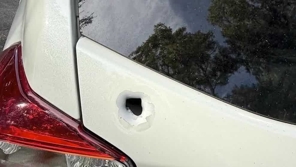 Bullet hole in a vehicle trunk